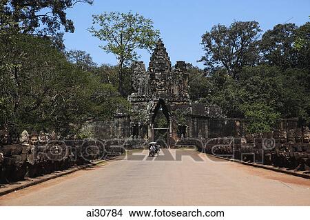 Picture - Trishaw on the road to Angkor Wat, Cambodia. Fotosearch