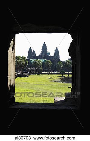 View of Angkor Wat through a stone window, Cambodia View Large Photo Image Stock Image - View of Angkor Wat through a stone window, Cambodia. Fotosearch