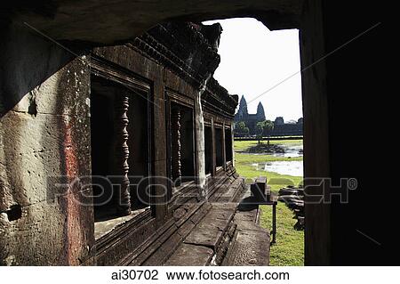 Stock Image - View through stone archway of Angkor Wat, Cambodia. Fotosearch