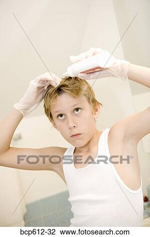 Closeup of boy dying hair View Large Photo Image Stock Image - Closeup of boy dying hair. Fotosearch