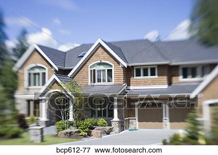 Front of large house on sunny day View Large Photo Image Stock Photo - Front of large house on sunny day. Fotosearch