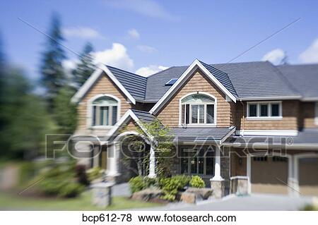 Front of large house on sunny day View Large Photo Image Stock Photo - Front of large house on sunny day. Fotosearch