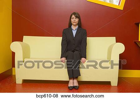 Nervous businesswoman waiting in colorful room View Large Photo Image Stock Photo - Nervous businesswoman waiting in colorful room. Fotosearch