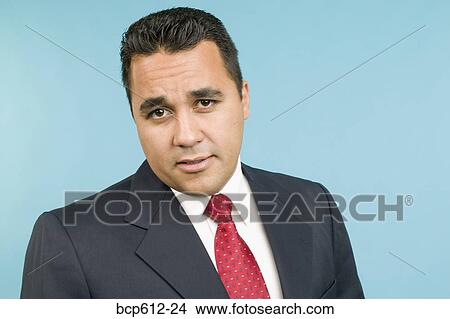 Picture - Portrait of concerned young businessman. Fotosearch
