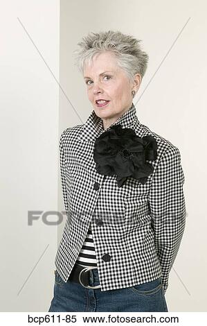 Portrait of fashionable middle aged woman View Large Photo Image Stock Photography - Portrait of fashionable middle aged woman. Fotosearch