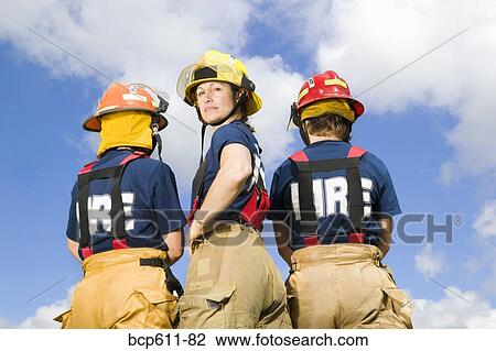 Portrait of female firefighters outdoors View Large Photo Image Stock Image - Portrait of female firefighters outdoors. Fotosearch