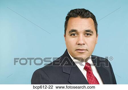 Portrait of serious young businessman View Large Photo Image Stock Image - Portrait of serious young businessman. Fotosearch