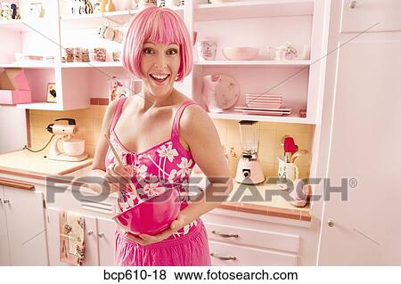 Woman with pink hair in pink kitchen View Large Photo Image Stock Photo - Woman with pink hair in pink kitchen. Fotosearch