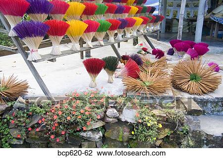 Stock Image - Bundles of incense outside Vietnamese factory. Fotosearch