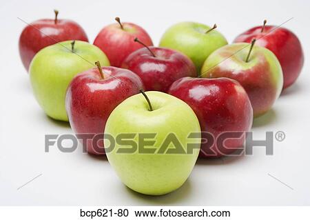 Closeup of apples arranged in triangle View Large Photo Image Stock Image - Closeup of apples arranged in triangle. Fotosearch