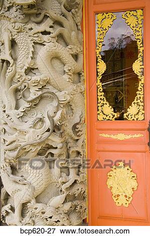 Closeup of carvings at doorway of Buddhist temple View Large Photo Image Stock Photo - Closeup of carvings at doorway of Buddhist temple. Fotosearch