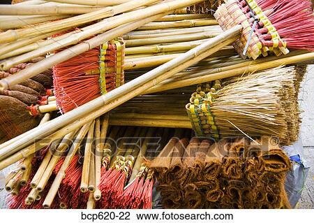 Closeup of colorful handmade brooms View Large Photo Image Stock Image - Closeup of colorful handmade brooms. Fotosearch