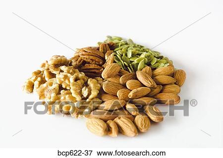 Closeup of pile of nut varieties View Large Photo Image Stock Photo - Closeup of pile of nut varieties. Fotosearch