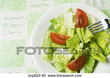 Closeup of salad with fork View Large Photo Image Stock Image - Closeup of salad with fork. Fotosearch