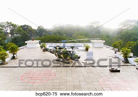 Helicopter on terrace surrounded by jungle View Large Photo Image Stock Photography - Helicopter on terrace surrounded by jungle. Fotosearch
