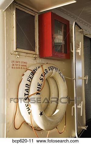 Life buoys on lower deck of ferry View Large Photo Image Stock Image - Life buoys on lower deck of ferry. Fotosearch