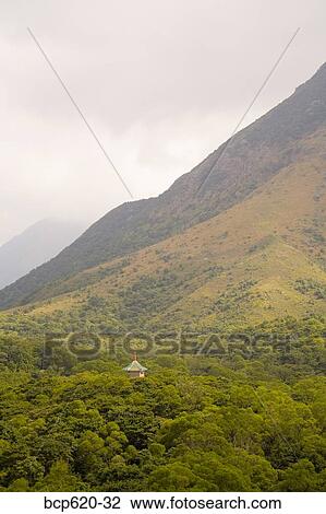 Mountains and storm clouds with roof of pagoda View Large Photo Image Stock Image - Mountains and storm clouds with roof of pagoda. Fotosearch