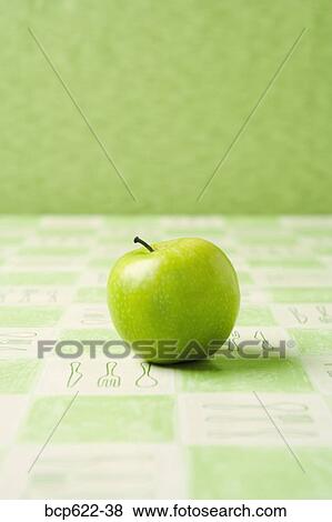 One granny smith apple View Large Photo Image Stock Photo - One granny smith apple. Fotosearch