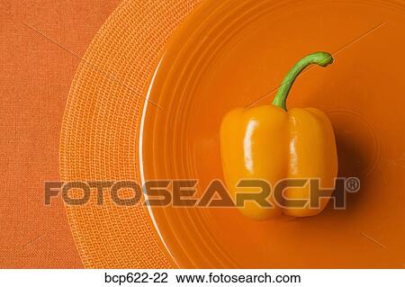 Orange sweet pepper on orange plate View Large Photo Image Stock Image - Orange sweet pepper on orange plate. Fotosearch