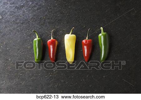 Row of fresh chili peppers View Large Photo Image Stock Image - Row of fresh chili peppers. Fotosearch