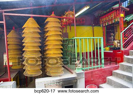 Small temple in Hong Kong side street View Large Photo Image Stock Photo - Small temple in Hong Kong side street. Fotosearch