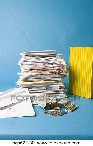 Stack of paperwork and money View Large Photo Image Stock Image - Stack of paperwork and money. Fotosearch