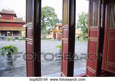 Wooden doors to courtyard at Vietnamese citadel View Large Photo Image Picture - Wooden doors to courtyard at Vietnamese citadel. Fotosearch
