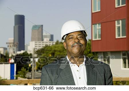afternoon, construction, businessman, business, african ethnicity View Large Photo Image Stock Photograph - afternoon, construction, businessman, business, african ethnicity. Fotosearch