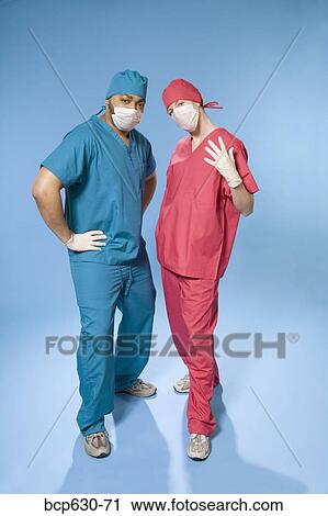 Stock Image - attitude, confidence, co-worker, caucasian, african ethnicity. Fotosearch