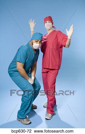 Stock Image - attitude, confidence, co-worker, caucasian, african ethnicity. Fotosearch