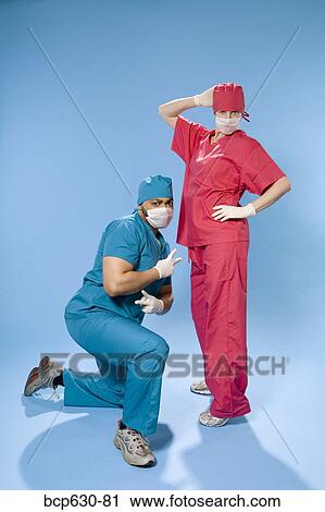 Stock Image - attitude, confidence, co-worker, caucasian, african ethnicity. Fotosearch