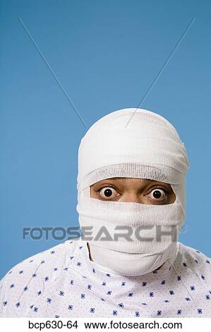 Picture - attitude, cut out, close up, bandage, african ethnicity. Fotosearch