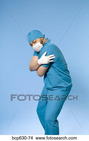 Picture - attitude, doctor, confidence, caucasian, african ethnicity. Fotosearch