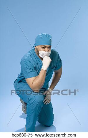 Stock Photography - attitude, fortysomething, education, doctor, african ethnicity. Fotosearch