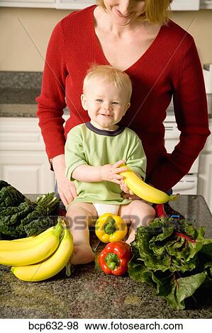 baby, banana, bell pepper, boy, caucasian, childhood View Large Photo Image Stock Photo - baby, banana, bell pepper, boy, caucasian, childhood. Fotosearch