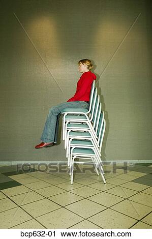 balance, balancing act, caucasian, chair, full body View Large Photo Image Stock Image - balance, balancing act, caucasian, chair, full body. Fotosearch