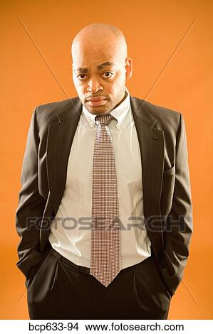 balding, fortysomething, businessman, african ethnicity View Large Photo Image Picture - balding, fortysomething, businessman, african ethnicity. Fotosearch