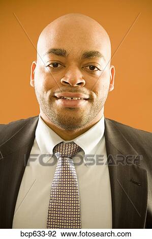 balding, fortysomething, businessman, african ethnicity View Large Photo Image Stock Image - balding, fortysomething, businessman, african ethnicity. Fotosearch