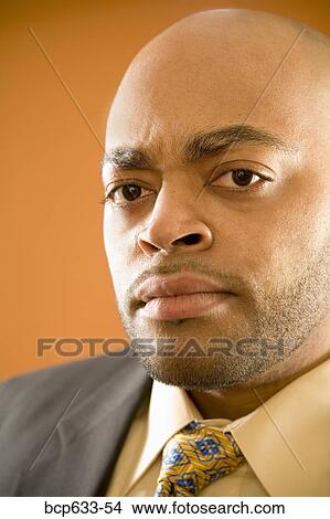 balding, fortysomething, close up, businessman, african ethnicity View Large Photo Image Picture - balding, fortysomething, close up, businessman, african ethnicity. Fotosearch