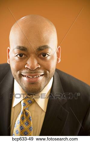 balding, fortysomething, close up, businessman, african ethnicity View Large Photo Image Stock Photo - balding, fortysomething, close up, businessman, african ethnicity. Fotosearch