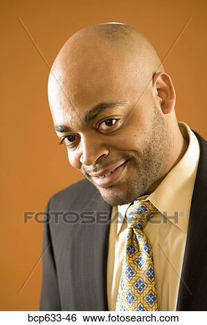 balding, fortysomething, close up, businessman, african ethnicity View Large Photo Image Stock Photograph - balding, fortysomething, close up, businessman, african ethnicity. Fotosearch