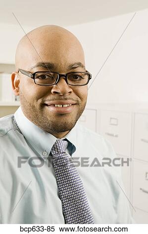 balding, fortysomething, eyeglasses, businessman, african ethnicity View Large Photo Image Stock Photography - balding, fortysomething, eyeglasses, businessman, african ethnicity. Fotosearch