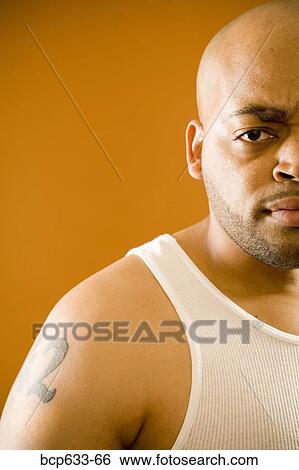 balding, frowning, fortysomething, close up, african ethnicity View Large Photo Image Stock Photograph - balding, frowning, fortysomething, close up, african ethnicity. Fotosearch