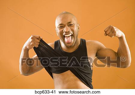 Stock Image - balding, happy, african ethnicity. Fotosearch