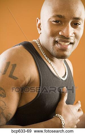 balding, head & shoulders, close up, chain, african ethnicity View Large Photo Image Stock Photo - balding, head & shoulders, close up, chain, african ethnicity. Fotosearch
