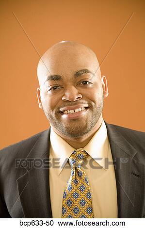 balding, head & shoulders, fortysomething, businessman, african ethnicity View Large Photo Image Stock Image - balding, head & shoulders, fortysomething, businessman, african ethnicity. Fotosearch