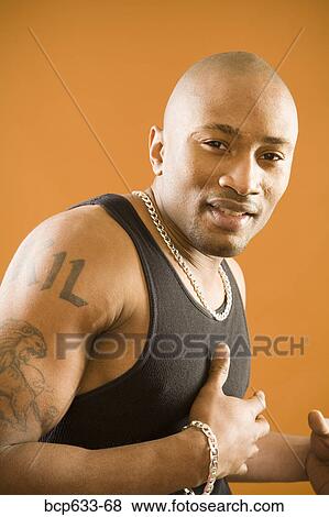 balding, jewelry, head & shoulders, chain, african ethnicity View Large Photo Image Stock Photo - balding, jewelry, head & shoulders, chain, african ethnicity. Fotosearch