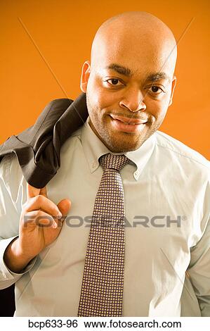 balding, looking at camera, fortysomething, businessman, african ethnicity View Large Photo Image Stock Photograph - balding, looking at camera, fortysomething, businessman, african ethnicity. Fotosearch