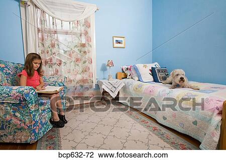 Stock Image - bedroom, childhood, caucasian, book, animals. Fotosearch