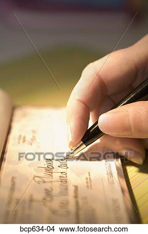 Picture - bill, bills, check, checkbook, close up. Fotosearch